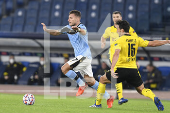 2020-10-20 -  ROME, ITALY - October 20 : Ciro Immobile ( L) of SS Lazio in action against Mats Hummels (R ) of Borussia Dortmund during the UEFA Champions League group f  soccer match between SS Lazio and Borussia Dortmund Stadio Olimpico on October 20,2020 in Rome Italy - SS LAZIO VS BORUSSIA DORTMUND - UEFA CHAMPIONS LEAGUE - SOCCER