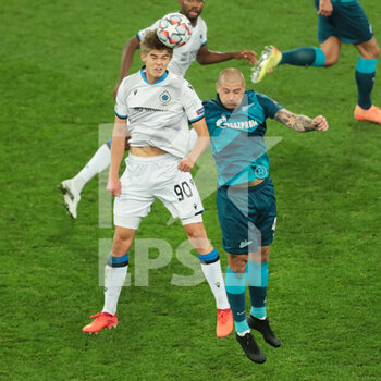 2020-10-20 - Charles de Ketelaere of Club Brugge and Yaroslav Rakitskiy of Zenit during the UEFA Champions League, Group Stage, Group F football match between Zenit and Club Brugge on October 20, 2020 at Saint Petersburg Stadium in Saint Petersburg, Russia - Photo Anatoliy Medved / Orange Pictures / DPPI - ZENIT VS CLUB BRUGGE - UEFA CHAMPIONS LEAGUE - SOCCER