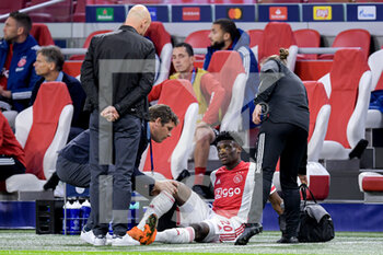 2020-10-21 - Mohammed Kudus of Ajax injured during the UEFA Champions League, Group Stage, Group D football match between Ajax and Liverpool on October 21, 2020 at Johan Cruijff ArenA in Amsterdam, Netherlands - Photo Gerrit van Keulen / Orange Pictures / DPPI - AJAX VS LIVERPOOL - UEFA CHAMPIONS LEAGUE - SOCCER