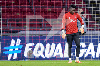 2020-10-21 - Andre Onana of Ajax warms up before the UEFA Champions League, Group Stage, Group D football match between Ajax and Liverpool on October 21, 2020 at Johan Cruijff ArenA in Amsterdam, Netherlands - Photo Gerrit van Keulen / Orange Pictures / DPPI -  AJAX VS LIVERPOOL - UEFA CHAMPIONS LEAGUE - SOCCER