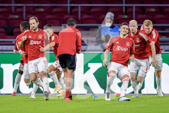 2020-10-21 - Team Ajax during warm-up before the UEFA Champions League, Group Stage, Group D football match between Ajax and Liverpool on October 21, 2020 at Johan Cruijff ArenA in Amsterdam, Netherlands - Photo Gerrit van Keulen / Orange Pictures / DPPI -  AJAX VS LIVERPOOL - UEFA CHAMPIONS LEAGUE - SOCCER