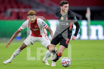 2020-10-21 - David Neres of Ajax, Andrew Robertson of Liverpool FC during the UEFA Champions League, Group Stage, Group D football match between Ajax and Liverpool on October 21, 2020 at Johan Cruijff ArenA in Amsterdam, Netherlands - Photo Gerrit van Keulen / Orange Pictures / DPPI -  AJAX VS LIVERPOOL - UEFA CHAMPIONS LEAGUE - SOCCER