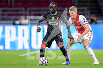2020-10-21 - Sadio Mane of Liverpool FC, Perr Schuurs of Ajax during the UEFA Champions League, Group Stage, Group D football match between Ajax and Liverpool on October 21, 2020 at Johan Cruijff ArenA in Amsterdam, Netherlands - Photo Gerrit van Keulen / Orange Pictures / DPPI -  AJAX VS LIVERPOOL - UEFA CHAMPIONS LEAGUE - SOCCER