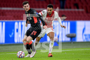 2020-10-21 - Andrew Robertson of Liverpool FC, Noussair Mazraoui of Ajax during the UEFA Champions League, Group Stage, Group D football match between Ajax and Liverpool on October 21, 2020 at Johan Cruijff ArenA in Amsterdam, Netherlands - Photo Gerrit van Keulen / Orange Pictures / DPPI -  AJAX VS LIVERPOOL - UEFA CHAMPIONS LEAGUE - SOCCER