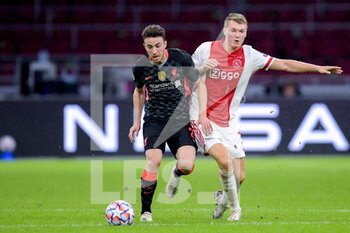 2020-10-21 - Diogo Jota of Liverpool FC, Perr Schuurs of Ajax during the UEFA Champions League, Group Stage, Group D football match between Ajax and Liverpool on October 21, 2020 at Johan Cruijff ArenA in Amsterdam, Netherlands - Photo Gerrit van Keulen / Orange Pictures / DPPI -  AJAX VS LIVERPOOL - UEFA CHAMPIONS LEAGUE - SOCCER