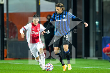 2020-10-27 - Nico Tagliafico of Ajax, Hans Hateboer of Atalanta during the UEFA Champions League, Group Stage, Group D football match between Atalanta BC and AFC Ajax on October 27, 2020 at Gewiss Stadium in Bergamo, Italy - Photo Gerrit van Keulen / Orange Pictures / DPPI - ATALANTA BC AND AFC AJAX - UEFA CHAMPIONS LEAGUE - SOCCER