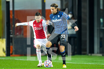 2020-10-27 - Nico Tagliafico of Ajax, Hans Hateboer of Atalanta during the UEFA Champions League, Group Stage, Group D football match between Atalanta BC and AFC Ajax on October 27, 2020 at Gewiss Stadium in Bergamo, Italy - Photo Gerrit van Keulen / Orange Pictures / DPPI - ATALANTA BC AND AFC AJAX - UEFA CHAMPIONS LEAGUE - SOCCER