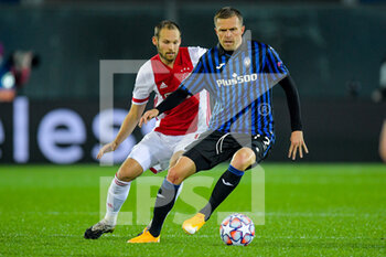 2020-10-27 - Daley Blind of Ajax, Josip Ilicic of Atalanta during the UEFA Champions League, Group Stage, Group D football match between Atalanta BC and AFC Ajax on October 27, 2020 at Gewiss Stadium in Bergamo, Italy - Photo Gerrit van Keulen / Orange Pictures / DPPI - ATALANTA BC AND AFC AJAX - UEFA CHAMPIONS LEAGUE - SOCCER