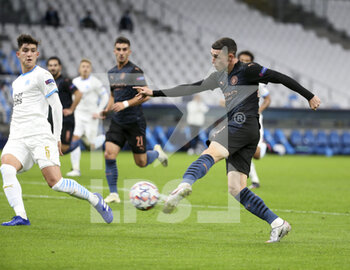 2020-10-27 - Phil Foden of Manchester City, Leonardo Balerdi of Marseille (left) during the UEFA Champions League, Group Stage, Group C football match between Olympique de Marseille and Manchester City on October 27, 2020 at Orange Velodrome stadium in Marseille, France - Photo Jean Catuffe / DPPI - OLYMPIQUE DE MARSEILLE VS MANCHESTER CITY - UEFA CHAMPIONS LEAGUE - SOCCER