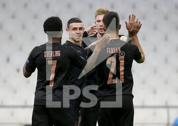 2020-10-27 - Ferran Torres of Manchester City celebrates his goal with Raheem Sterling, Phil Foden, Kevin de Bruyne during the UEFA Champions League, Group Stage, Group C football match between Olympique de Marseille and Manchester City on October 27, 2020 at Orange Velodrome stadium in Marseille, France - Photo Jean Catuffe / DPPI - OLYMPIQUE DE MARSEILLE VS MANCHESTER CITY - UEFA CHAMPIONS LEAGUE - SOCCER
