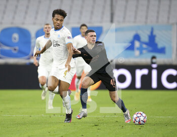 2020-10-27 - Boubacar Kamara of Marseille, Phil Foden of Manchester City during the UEFA Champions League, Group Stage, Group C football match between Olympique de Marseille and Manchester City on October 27, 2020 at Orange Velodrome stadium in Marseille, France - Photo Jean Catuffe / DPPI - OLYMPIQUE DE MARSEILLE VS MANCHESTER CITY - UEFA CHAMPIONS LEAGUE - SOCCER