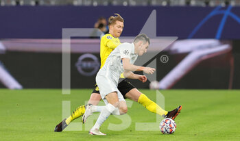 2020-10-28 - Marco Reus of Borussia Dortmund and Vyacheslav Karavayev of Zenit during the UEFA Champions League, Group Stage, Group F football match between Borussia Dortmund and Zenit on October 28, 2020 at Signal Iduna Park in Dortmund, Germany - Photo Ralf Ibing / firo Sportphoto / DPPI - BORUSSIA DORTMUND VS ZENIT - UEFA CHAMPIONS LEAGUE - SOCCER