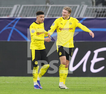 2020-11-24 - Jadon Sancho of Borussia Dortmund celebrates after his 2-0 goal with Erling Haaland during the UEFA Champions League, Group F football match between Borussia Dortmund and Club Brugge on November 24, 2020 at Signal Iduna Park in Dortmund, Germany - Photo Ralf Ibing / firo Sportphoto / DPPI - BORUSSIA DORTMUND VS CLUB BRUGGE - UEFA CHAMPIONS LEAGUE - SOCCER