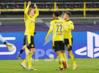 2020-11-24 - Erling Haaland of Borussia Dortmund celebrates after the 3-0 goal with Jude Bellingham and Thorgan Hazard during the UEFA Champions League, Group F football match between Borussia Dortmund and Club Brugge on November 24, 2020 at Signal Iduna Park in Dortmund, Germany - Photo Ralf Ibing / firo Sportphoto / DPPI - BORUSSIA DORTMUND VS CLUB BRUGGE - UEFA CHAMPIONS LEAGUE - SOCCER