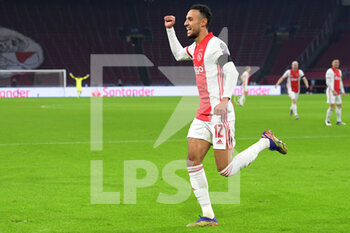 2020-11-25 - Noussair Mazraoui of Ajax celebrates after his goal during the UEFA Champions League, Group D football match between Ajax and Midtjylland on november 25, 2020 at Johan Cruijff Arena in Amsterdam, Netherlands - Photo Gerrit van Keulen / Orange Pictures / DPPI - AJAX VS MIDTJYLLAND - UEFA CHAMPIONS LEAGUE - SOCCER