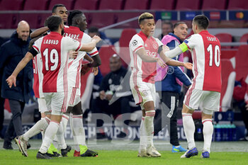 2020-11-25 - David Neres of Ajax celebrates after his goal with teammates during the UEFA Champions League, Group D football match between Ajax and Midtjylland on november 25, 2020 at Johan Cruijff Arena in Amsterdam, Netherlands - Photo Gerrit van Keulen / Orange Pictures / DPPI - AJAX VS MIDTJYLLAND - UEFA CHAMPIONS LEAGUE - SOCCER