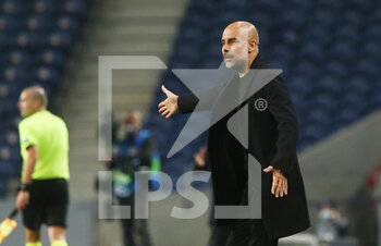 2020-12-01 - Manchester City manager Josep Guardiola gestures during the UEFA Champions League, Group C football match between FC Porto and Manchester City on December 1, 2020 at Estadio do Dragao in Porto, Portugal - Photo Nuno Guimaraes / ProSportsImages / DPPI - FC PORTO VS MANCHESTER CITY - UEFA CHAMPIONS LEAGUE - SOCCER