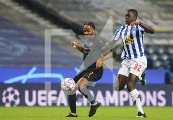 2020-12-01 - Manchester City forward Raheem Sterling in action with Malang Sarr of Porto during the UEFA Champions League, Group C football match between FC Porto and Manchester City on December 1, 2020 at Estadio do Dragao in Porto, Portugal - Photo Nuno Guimaraes / ProSportsImages / DPPI - FC PORTO VS MANCHESTER CITY - UEFA CHAMPIONS LEAGUE - SOCCER