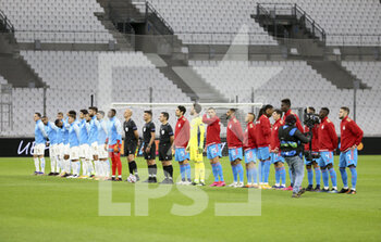 2020-12-01 - Team Marseille and team Olympiacos pose before the UEFA Champions League, Group C football match between Olympique de Marseille (OM) and Olympiacos FC (Olympiakos) on December 1, 2020 at Stade Velodrome in Marseille, France - Photo Jean Catuffe / DPPI - OLYMPIQUE DE MARSEILLE VS OLYMPIACOS FC - UEFA CHAMPIONS LEAGUE - SOCCER