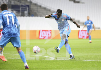 2020-12-01 - Mady Camara of Olympiacos scores his goal during the UEFA Champions League, Group C football match between Olympique de Marseille (OM) and Olympiacos FC (Olympiakos) on December 1, 2020 at Stade Velodrome in Marseille, France - Photo Jean Catuffe / DPPI - OLYMPIQUE DE MARSEILLE VS OLYMPIACOS FC - UEFA CHAMPIONS LEAGUE - SOCCER