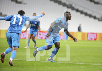 2020-12-01 - Mady Camara of Olympiacos celebrates his goal during the UEFA Champions League, Group C football match between Olympique de Marseille (OM) and Olympiacos FC (Olympiakos) on December 1, 2020 at Stade Velodrome in Marseille, France - Photo Jean Catuffe / DPPI - OLYMPIQUE DE MARSEILLE VS OLYMPIACOS FC - UEFA CHAMPIONS LEAGUE - SOCCER