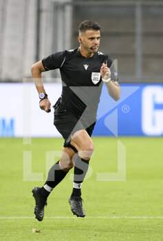 2020-12-01 - Referee Jesus Gil Manzano of Spain during the UEFA Champions League, Group C football match between Olympique de Marseille (OM) and Olympiacos FC (Olympiakos) on December 1, 2020 at Stade Velodrome in Marseille, France - Photo Jean Catuffe / DPPI - OLYMPIQUE DE MARSEILLE VS OLYMPIACOS FC - UEFA CHAMPIONS LEAGUE - SOCCER