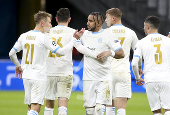 2020-12-01 - Dimitri Payet of Marseille celebrates his first goal on a penalty kick with Valentin Rongier (left) and teammates during the UEFA Champions League, Group C football match between Olympique de Marseille (OM) and Olympiacos FC (Olympiakos) on December 1, 2020 at Stade Velodrome in Marseille, France - Photo Jean Catuffe / DPPI - OLYMPIQUE DE MARSEILLE VS OLYMPIACOS FC - UEFA CHAMPIONS LEAGUE - SOCCER