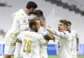2020-12-01 - Dimitri Payet of Marseille celebrates his second goal on a penalty kick with Valere Germain, Valentin Rongier and teammates during the UEFA Champions League, Group C football match between Olympique de Marseille (OM) and Olympiacos FC (Olympiakos) on December 1, 2020 at Stade Velodrome in Marseille, France - Photo Jean Catuffe / DPPI - OLYMPIQUE DE MARSEILLE VS OLYMPIACOS FC - UEFA CHAMPIONS LEAGUE - SOCCER