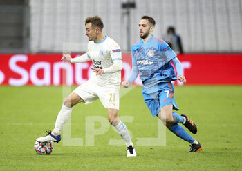 2020-12-01 - Valentin Rongier of Marseille, Kostas Fortounis of Olympiacos during the UEFA Champions League, Group C football match between Olympique de Marseille (OM) and Olympiacos FC (Olympiakos) on December 1, 2020 at Stade Velodrome in Marseille, France - Photo Jean Catuffe / DPPI - OLYMPIQUE DE MARSEILLE VS OLYMPIACOS FC - UEFA CHAMPIONS LEAGUE - SOCCER