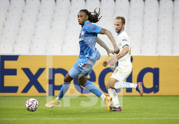 2020-12-01 - Ruben Semedo of Olympiacos, Valere Germain of Marseille during the UEFA Champions League, Group C football match between Olympique de Marseille (OM) and Olympiacos FC (Olympiakos) on December 1, 2020 at Stade Velodrome in Marseille, France - Photo Jean Catuffe / DPPI - OLYMPIQUE DE MARSEILLE VS OLYMPIACOS FC - UEFA CHAMPIONS LEAGUE - SOCCER