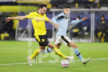 2020-12-02 - Mats Hummels of Borussia Dortmund and Joaquin Correa of Lazio during the UEFA Champions League, Group F football match between Borussia Dortmund and SS Lazio on December 2, 2020 at Signal Iduna Park in Dortmund, Germany - Photo Jurgen Fromme / firo Sportphoto / DPPI - BORUSSIA DORTMUND VS SS LAZIO - UEFA CHAMPIONS LEAGUE - SOCCER