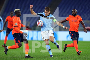 2020-12-08 - Ciro Immobile of Lazio (C) fights for the ball with Krepin Diatta (L) and Eder Balanta (R) of Club Brugge during the UEFA Champions League, Group F football match between SS Lazio and Club Brugge KV on December 8, 2020 at Stadio Olimpico in Rome, Italy - Photo Federico Proietti / DPPI - SS LAZIO VS CLUB BRUGGE KV - UEFA CHAMPIONS LEAGUE - SOCCER