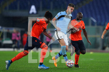 2020-12-08 - Sergej Milinkovic Savic of Lazio (C) vies for the ball with Simon Deli (L) and Eder Balanta (R) of Club Brugge during the UEFA Champions League, Group F football match between SS Lazio and Club Brugge KV on December 8, 2020 at Stadio Olimpico in Rome, Italy - Photo Federico Proietti / DPPI - SS LAZIO VS CLUB BRUGGE KV - UEFA CHAMPIONS LEAGUE - SOCCER