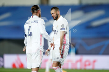2020-12-09 - Karim Benzema of Real Madrid celebrates with Sergio Ramos during the UEFA Champions League, Group B football match between Real Madrid and Borussia Monchengladbach on december 9, 2020 at Ciudad Deportiva Real Madrid in Valdebebas, Madrid, Spain - Photo Oscar J Barroso / Spain DPPI / DPPI - REAL MADRID VS BORUSSIA MONCHENGLADBACH - UEFA CHAMPIONS LEAGUE - SOCCER