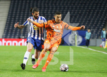 2021-02-17 - Sergio Oliveira of Porto in action with Juventus Cristiano Ronaldo during the UEFA Champions League, Round of 16, 1st leg football match between FC Porto and Juventus FC on February 17, 2021 at Estadio do Dragao in Porto, Portugal - Photo Nuno Guimaraes / ProSportsImages / DPPI - FC PORTO AND JUVENTUS FC - UEFA CHAMPIONS LEAGUE - SOCCER
