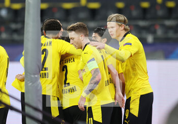 2021-03-09 - Erling Haaland of Borussia Dortmund celebrates after the 1-0 goal with Marco Reus during the UEFA Champions League, round of 16, 2nd leg football match between Borussia Dortmund and FC Sevilla on March 9, 2021 at Signal Iduna Park in Dortmund, Germany - Photo Jurgen Fromme / firo sportphoto / DPPI - BORUSSIA DORTMUND AND FC SEVILLA - UEFA CHAMPIONS LEAGUE - SOCCER