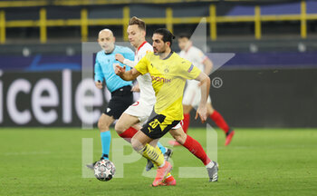 2021-03-09 - Ivan Rakitic of FC Sevilla and Emre Can of Borussia Dortmund during the UEFA Champions League, round of 16, 2nd leg football match between Borussia Dortmund and FC Sevilla on March 9, 2021 at Signal Iduna Park in Dortmund, Germany - Photo Jurgen Fromme / firo sportphoto / DPPI - BORUSSIA DORTMUND AND FC SEVILLA - UEFA CHAMPIONS LEAGUE - SOCCER