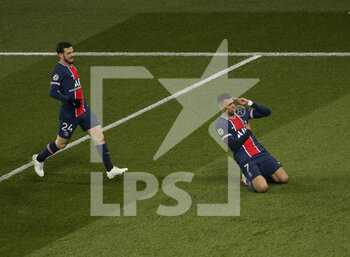 2021-03-10 - Kylian Mbappe of PSG celebrates his goal on a penalty kick with Alessandro Florenzi during the UEFA Champions League, round of 16, 2nd leg football match between Paris Saint-Germain (PSG) and FC Barcelona (Barca) on March 10, 2021 at Parc des Princes stadium in Paris, France - Photo Jean Catuffe / DPPI - PARIS SAINT-GERMAIN (PSG) AND FC BARCELONA (BARCA) - UEFA CHAMPIONS LEAGUE - SOCCER