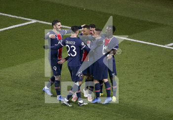 2021-03-10 - Kylian Mbappe of PSG celebrates his goal on a penalty kick with teammates during the UEFA Champions League, round of 16, 2nd leg football match between Paris Saint-Germain (PSG) and FC Barcelona (Barca) on March 10, 2021 at Parc des Princes stadium in Paris, France - Photo Jean Catuffe / DPPI - PARIS SAINT-GERMAIN (PSG) AND FC BARCELONA (BARCA) - UEFA CHAMPIONS LEAGUE - SOCCER