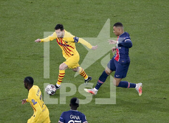2021-03-10 - Lionel Messi of Barcelona, Kylian Mbappe of PSG during the UEFA Champions League, round of 16, 2nd leg football match between Paris Saint-Germain (PSG) and FC Barcelona (Barca) on March 10, 2021 at Parc des Princes stadium in Paris, France - Photo Jean Catuffe / DPPI - PARIS SAINT-GERMAIN (PSG) AND FC BARCELONA (BARCA) - UEFA CHAMPIONS LEAGUE - SOCCER