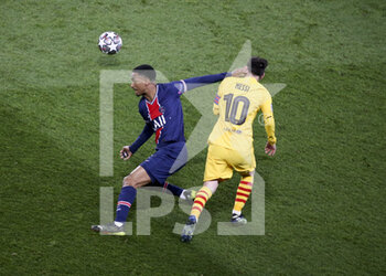 2021-03-10 - Abdou Diallo of PSG, Lionel Messi of Barcelona during the UEFA Champions League, round of 16, 2nd leg football match between Paris Saint-Germain (PSG) and FC Barcelona (Barca) on March 10, 2021 at Parc des Princes stadium in Paris, France - Photo Jean Catuffe / DPPI - PARIS SAINT-GERMAIN (PSG) AND FC BARCELONA (BARCA) - UEFA CHAMPIONS LEAGUE - SOCCER