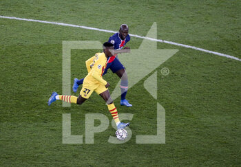 2021-03-10 - Ilaix Moriba of Barcelona, Danilo Pereira of PSG during the UEFA Champions League, round of 16, 2nd leg football match between Paris Saint-Germain (PSG) and FC Barcelona (Barca) on March 10, 2021 at Parc des Princes stadium in Paris, France - Photo Jean Catuffe / DPPI - PARIS SAINT-GERMAIN (PSG) AND FC BARCELONA (BARCA) - UEFA CHAMPIONS LEAGUE - SOCCER