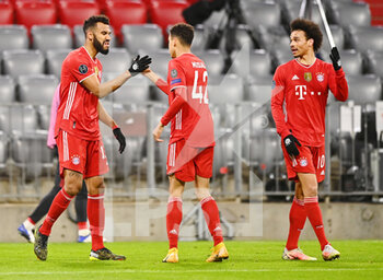 2021-03-17 - Eric Maxim Choupo-Moting of Bayern Munich celebrates after his goal 2-0 with Jamal Musiala, Leroy Sane during the UEFA Champions League, round of 16, 2nd leg football match between Bayern Munich and SS Lazio on March 17, 2021 at Allianz Arena in Munich, Germany - Photo Lennart Preiss / Witters / firo sportphoto / DPPI - BAYERN MUNICH AND SS LAZIO - UEFA CHAMPIONS LEAGUE - SOCCER