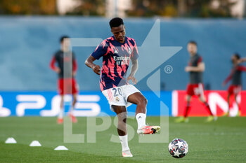 2021-04-06 - Vinicius Junior of Real Madrid warms up during the UEFA Champions League, Quarter final, 1st leg football match between Real Madrid and Liverpool FC on April 6, 2021 at Alfredo Di Stefano stadium in Valdebebas, Madrid, Spain - Photo Oscar J Barroso / Spain DPPI / DPPI - REAL MADRID AND LIVERPOOL FC - UEFA CHAMPIONS LEAGUE - SOCCER