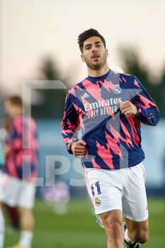 2021-04-06 - Marco Asensio of Real Madrid warms up during the UEFA Champions League, Quarter final, 1st leg football match between Real Madrid and Liverpool FC on April 6, 2021 at Alfredo Di Stefano stadium in Valdebebas, Madrid, Spain - Photo Oscar J Barroso / Spain DPPI / DPPI - REAL MADRID AND LIVERPOOL FC - UEFA CHAMPIONS LEAGUE - SOCCER