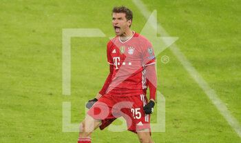 2021-04-07 - Thomas Mueller of Bayern Munich celebrates after his goal 2-2 during the UEFA Champions League, quarter final, 1st leg football match between Bayern Munich and Paris Saint-Germain on April 7, 2021 at Allianz Arena in Munich, Germany - Photo Marcel Engelbrecht / firo Sportphoto / DPPI - BAYERN MUNICH VS PARIS SAINT-GERMAIN - UEFA CHAMPIONS LEAGUE - SOCCER