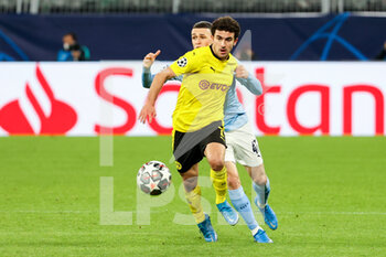 2021-04-14 - Mateu Morey of Borussia Dortmund and Phil Foden of Manchester City during the UEFA Champions League, Quarter-Finals, 2nd leg football match between Borussia Dortmund and Manchester City on April 14, 2021 at Signal Iduna Park in Dortmund, Germany - Photo Joachim Bywaletz / Orange Pictures / DPPI - BORUSSIA DORTMUND VS MANCHESTER CITY - UEFA CHAMPIONS LEAGUE - SOCCER