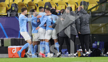 2021-04-14 - Manchester City players celebrate after the Phil Foden's goal 1-2 during the UEFA Champions League, Quarter-Finals, 2nd leg football match between Borussia Dortmund and Manchester City on April 14, 2021 at Signal Iduna Park in Dortmund, Germany - Photo Ralf Ibing / firo Sportphoto / DPPI - BORUSSIA DORTMUND VS MANCHESTER CITY - UEFA CHAMPIONS LEAGUE - SOCCER