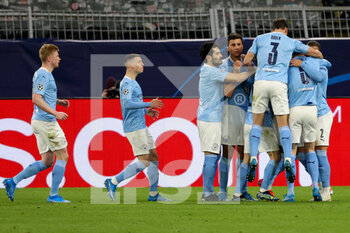2021-04-14 - Riyad Mahrez of Manchester City celebrating his goal with teammates during the UEFA Champions League, Quarter-Finals, 2nd leg football match between Borussia Dortmund and Manchester City on April 14, 2021 at Signal Iduna Park in Dortmund, Germany - Photo Joachim Bywaletz / Orange Pictures / DPPI - BORUSSIA DORTMUND VS MANCHESTER CITY - UEFA CHAMPIONS LEAGUE - SOCCER