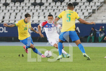 2021-07-03 - Alexis Sanchez of Chile and Roberto Firmino, Casemiro of Brazil during the Copa America 2021, quarter final football match between Brazil and Chile on July 3, 2021 at Olympic stadium in Rio de Janeiro, Brazil - Photo Laurent Lairys / DPPI - 2021 QUARTER FINAL - BRAZIL VS CHILE - COPA AMERICA - SOCCER